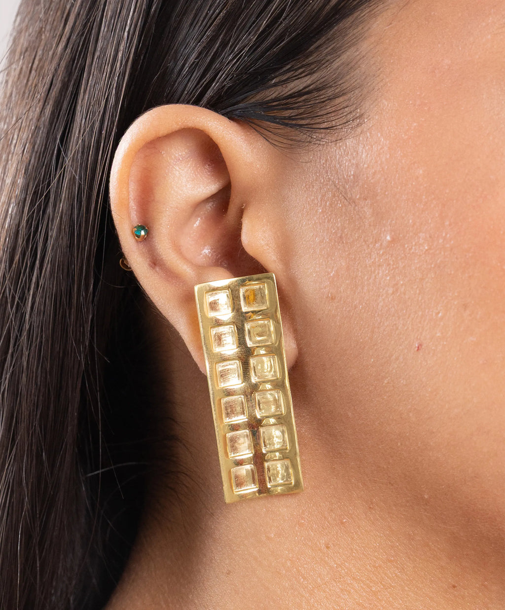 MAISON MEGH Kitthh Long Studs jewelry featuring sleek, elongated silver-tone studs with detailed geometric design.