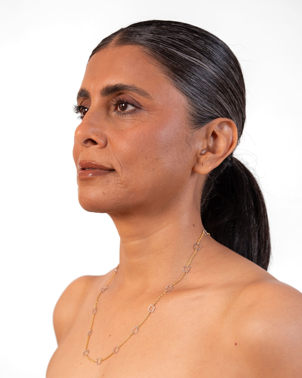 Close-up of MAISON MEGH Mega Linky Chain Square, showcasing its interconnected metal links and detailed craftsmanship.